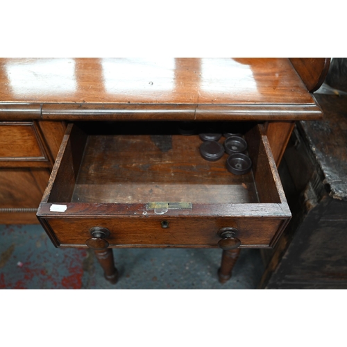 899 - A Victorian mahogany 3/4 galleried sideboard, with an arrangement of three drawers and centred by a ... 