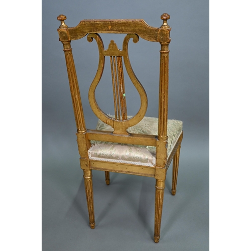 900 - A pair of 19th century Empire giltwood side/music chairs with lyre-back splats (2)