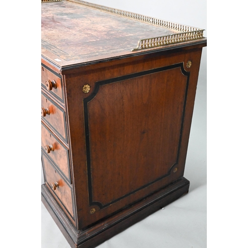 903 - A Victorian Aesthetic period ebonised and walnut pedestal desk, the tooled leather inset top with br... 