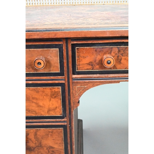 903 - A Victorian Aesthetic period ebonised and walnut pedestal desk, the tooled leather inset top with br... 