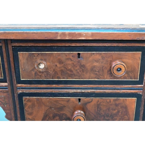 903 - A Victorian Aesthetic period ebonised and walnut pedestal desk, the tooled leather inset top with br... 