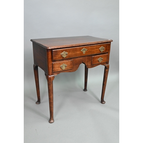 904 - An 18th century fruitwood three drawer side table with arched apron on turned legs and pad feet, 73 ... 