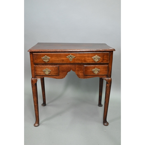 904 - An 18th century fruitwood three drawer side table with arched apron on turned legs and pad feet, 73 ... 