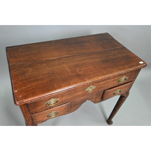 904 - An 18th century fruitwood three drawer side table with arched apron on turned legs and pad feet, 73 ... 