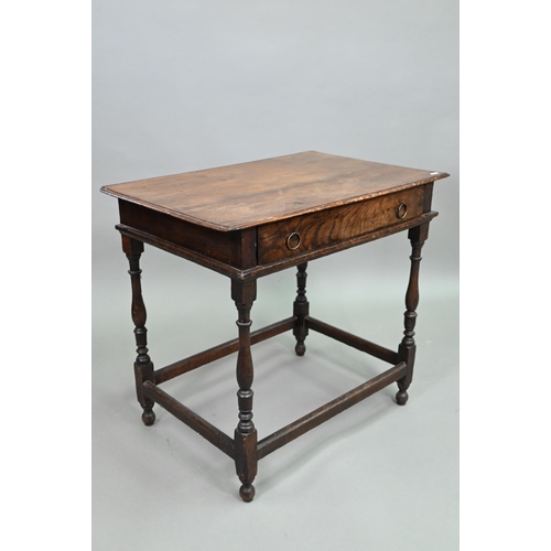 910 - An 18th century oak side table with single drawer, raised on a turned frame united by all-round stre... 