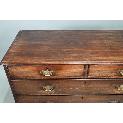 914 - A Georgian mahogany chest of two short over three long graduated drawers, with brass fittings, on sh... 