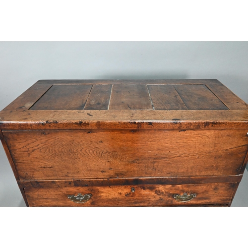 915 - An 18th century and later composed oak and elm chest, the hinged top over three long graduated drawe... 