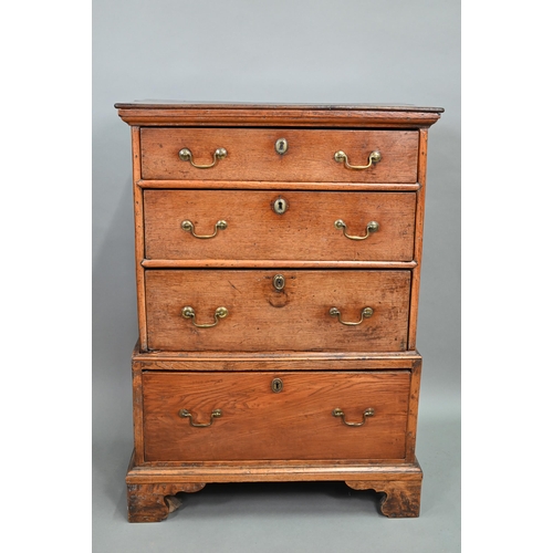 916 - An 18th century oak chest on stand, of diminutive proportions comprising three long graduated drawer... 