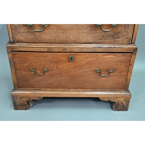 916 - An 18th century oak chest on stand, of diminutive proportions comprising three long graduated drawer... 