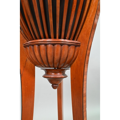 917 - An antique satinwood jardinière stand with brass liner and slatted sides, raised on slender t... 