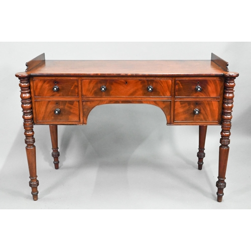 924 - A Victorian kneehole five drawer sideboard, the top with raised gallery sides (back missing) and lob... 