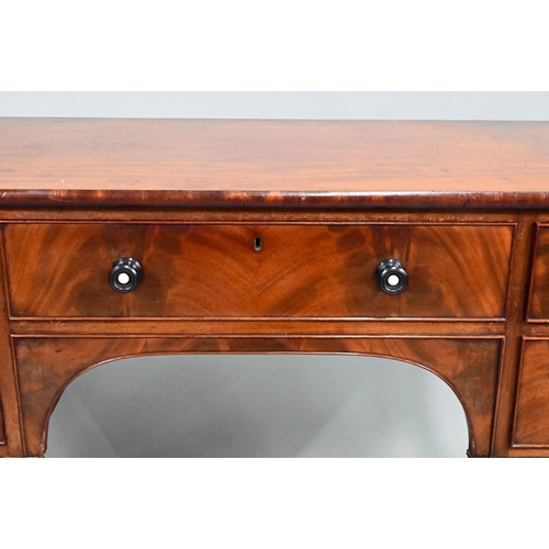 924 - A Victorian kneehole five drawer sideboard, the top with raised gallery sides (back missing) and lob... 