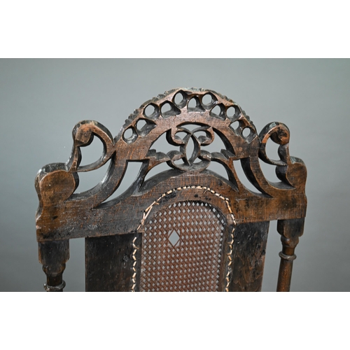 926 - A William & Mary oak framed cane panelled armchair, with moulded frame, scroll arm ends and fron... 