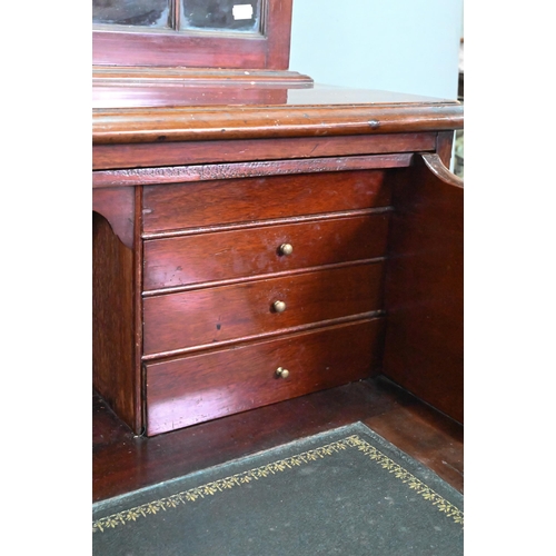 928 - A George III mahogany secretaire bookcase, the dentil moulded cornice over a pair of astragal glazed... 