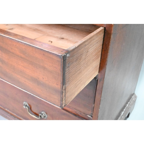 928 - A George III mahogany secretaire bookcase, the dentil moulded cornice over a pair of astragal glazed... 