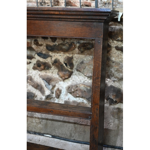 929 - An antique oak delft rack, with two small cupboard doors and open back, 143 cm w x 14 cm x 102 cm h