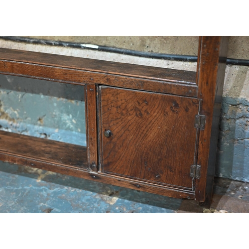 929 - An antique oak delft rack, with two small cupboard doors and open back, 143 cm w x 14 cm x 102 cm h