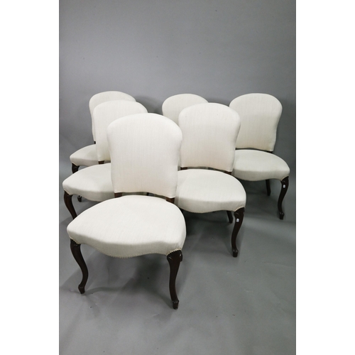 931 - A set of six traditional French walnut framed upholstered dining side chairs, with linen covers and ... 