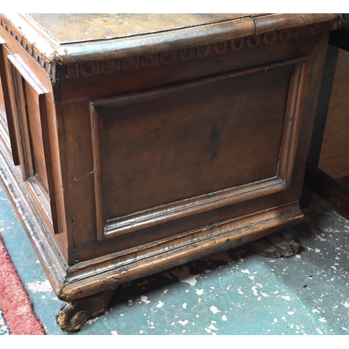 935 - A late 17th/18th century Italian walnut cassone, the staple hinged top with carved frieze band, over... 