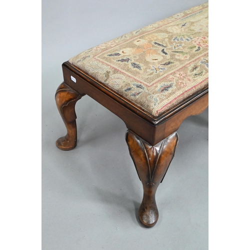 947 - A Georgian style walnut framed six legged long stool with drop in tapestry seat, early 20th century,... 