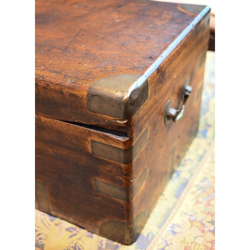 957 - A 19th century brass bound camphorwood campaign style trunk, folding brass handles to sides, the hin... 