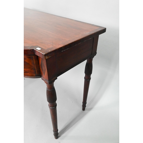 962 - A Victorian cross-banded mahogany bow-fronted serving table, with three frieze drawers, raised on sl... 