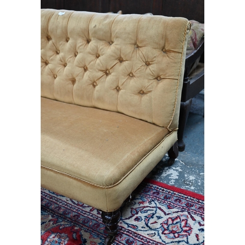 970 - A Victorian button backed hall/banquette sofa, yellow-gold fabric, raised on turned mahogany front l... 