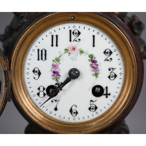 974 - An antique French rouge marble spelter mounted mantel clock, the 8-day two train movement by Moulin,... 