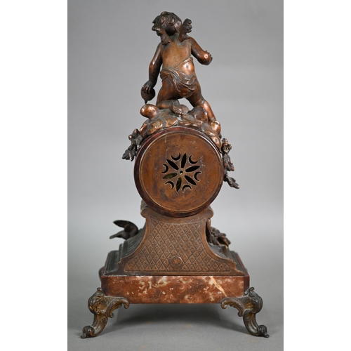 974 - An antique French rouge marble spelter mounted mantel clock, the 8-day two train movement by Moulin,... 