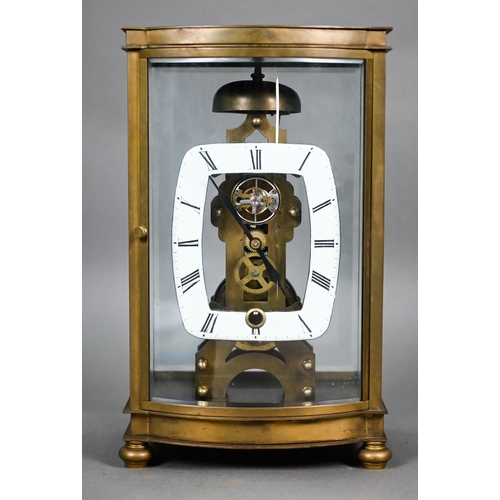 981 - An unusual four window brass framed skeleton clock with open oval white enamelled dial, the single t... 