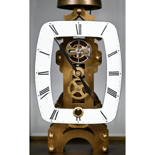 981 - An unusual four window brass framed skeleton clock with open oval white enamelled dial, the single t... 