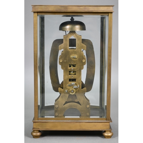 981 - An unusual four window brass framed skeleton clock with open oval white enamelled dial, the single t... 