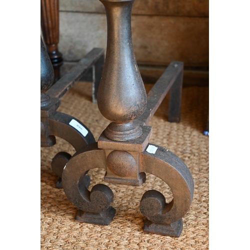 988 - A pair of 17th century style fire dogs, with antique/patinated finish with ball finials, 52 cm h (2)