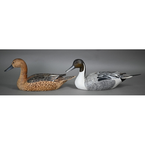 996 - Two 20th century painted wood duck decoys, inscribed 'By Stiles '76', 43/38 cm (one with swivelling ... 