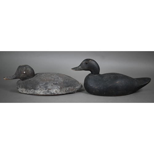 998 - A painted wood duck decoy with glass bead eyes and metal weighted tail, 13 x 36 cm to/w a later duck... 