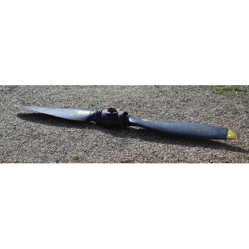 1120 - A Vintage Avro Anson aircraft twin blade propeller, black finish with yellow tips, marked 'DA 902' a... 