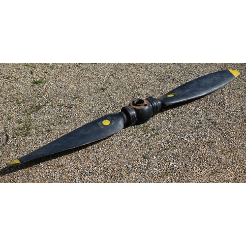 1120 - A Vintage Avro Anson aircraft twin blade propeller, black finish with yellow tips, marked 'DA 902' a... 