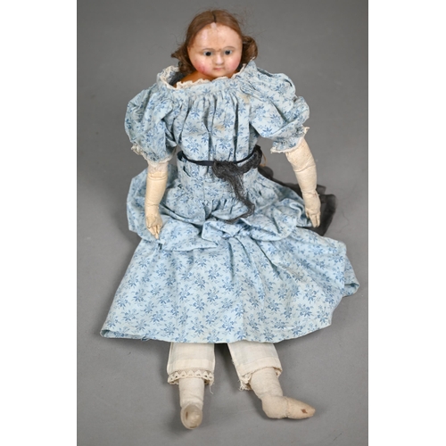 1159 - A 19th century wax-headed girl-doll with brown wig and fixed brown eyes, on stuffed fabric body with... 