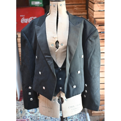 1198 - A black wool jacket and matching waistcoat, with square white metal buttons, size 54L