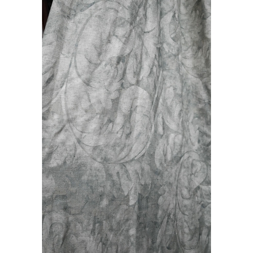 1210 - A pair of long country house curtains in pale grey with stylised acanthus leaf decoration, triple pl... 