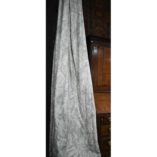 1210 - A pair of long country house curtains in pale grey with stylised acanthus leaf decoration, triple pl... 