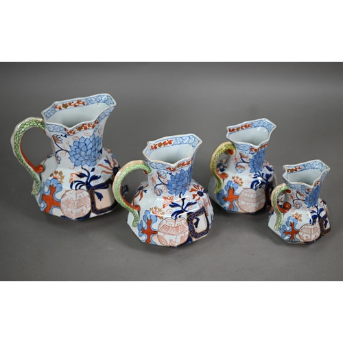 578A - An early 19th century graduated set of four Davenport stone china jugs, 18-11cm