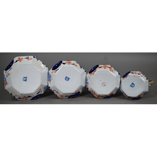 578A - An early 19th century graduated set of four Davenport stone china jugs, 18-11cm