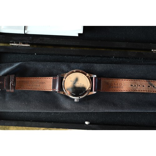 427 - A Nomos Club wristwatch - model 3564 with leather strap, boxed with documents, 2018