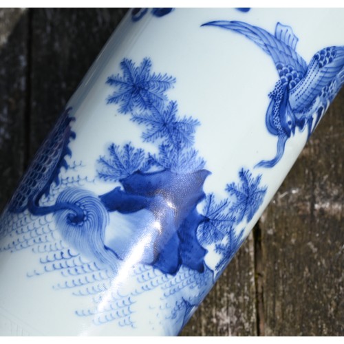 441 - A Chinese Transitional style blue and white sleeve vase, painted in rich tones of underglaze blue wi... 