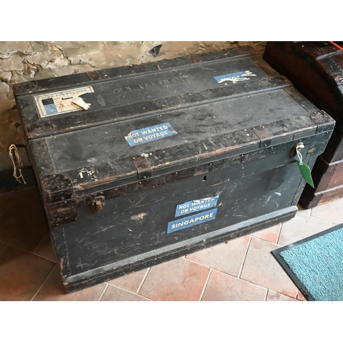 27 - Two vintage black tin trunks to/with a steel bound trunk and a black tin box (4) 