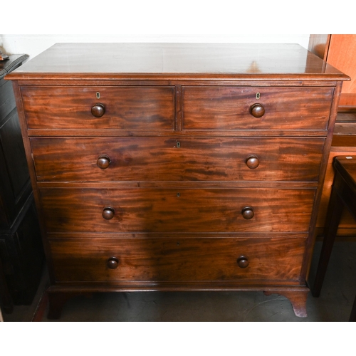 340 - A 19th century mahogany chest of two short over three long graduated drawers on splayed bracket feet... 