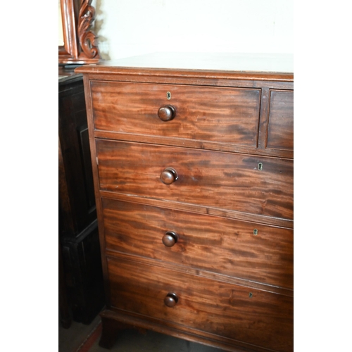 340 - A 19th century mahogany chest of two short over three long graduated drawers on splayed bracket feet... 