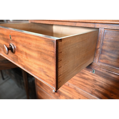 340 - A 19th century mahogany chest of two short over three long graduated drawers on splayed bracket feet... 