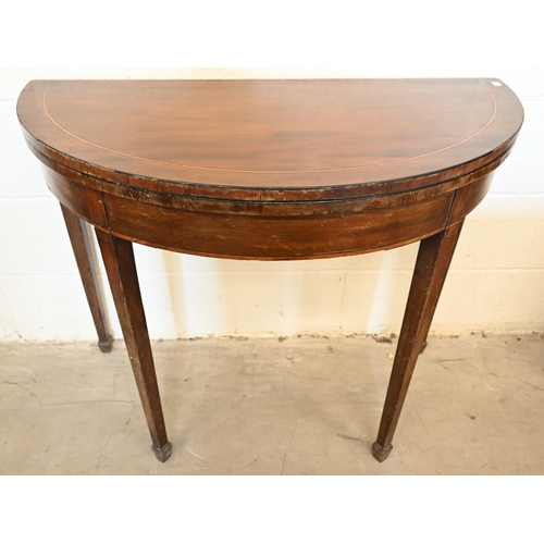 342 - #A 19th century mahogany inlaid demi lune tea table with folding top on tapering square legs, 92 cm ... 